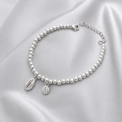 pulseira de contas com concha e flor, variante dourada, pedra clara, referência 85576-1