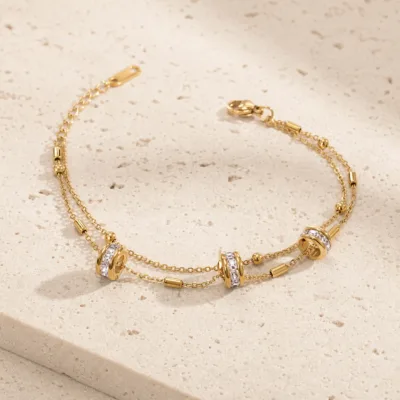 pulseira dourada dupla com aros de cristais, imagem 2, referência 85576-2