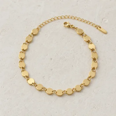 pulseira dourada com discos redondos, imagem 1, referência 85577