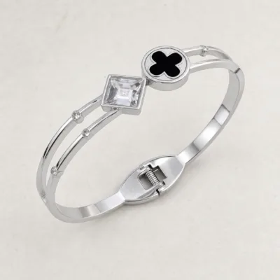 bracelete com trevo preto e cristal quadrado, variante dourada, pedra clara, referência 85579-4