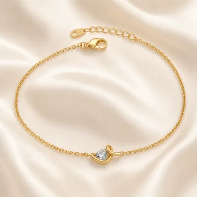 pulseira de coração com cristal, variante dourada, cetim marfim, referência 85589