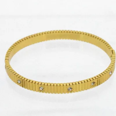 Pulseira dourada rígida com pedras transparentes 85270-2, vista completa