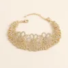 Pulseira Larga Dourada com Motivos Florais — A — Dourado