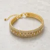 Pulseira Larga com Elementos Facetados — 2 Modelos — A — Dourado