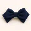 Gancho de cabelo com laço duplo acolchoado azul-marinho