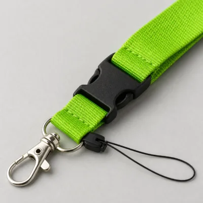 Detalhe do fecho, gancho e tecido da fita verde fluorescente