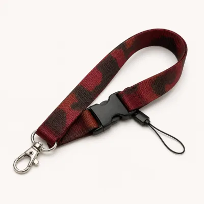 Fita de pulso camuflada vermelha e castanha para chaves e telemóvel