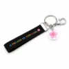 Porta-chaves preto EU ❤ Portugal com pendente de flor rosa, referência 13116-R001-3-A