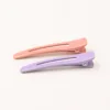 Conjunto de dois ganchos bico de pato infantis rosa e lilás