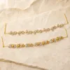 Dois modelos de corrente dourada para cabelo com zircónias