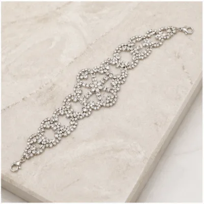 Pulseira prateada de 22 cm com fecho e corrente extensora