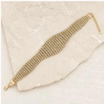 Pulseira dourada de 22 cm com fecho e corrente extensora