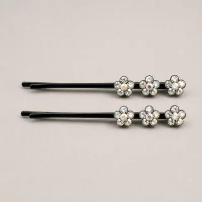 Conjunto de dois ganchos pretos com três flores de cristais