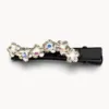 Gancho preto com flores de strass transparente em fundo branco