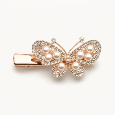 Gancho bico de pato rosa-dourado com borboleta e pérolas