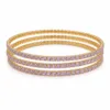 Conjunto de quatro pulseiras douradas com cristais lilás-claro