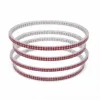 Conjunto de quatro pulseiras prateadas com cristais vermelhos