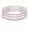 Conjunto de quatro pulseiras prateadas com cristais rosa-claro
