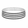 Conjunto de quatro pulseiras prateadas com cristais pretos e transparentes