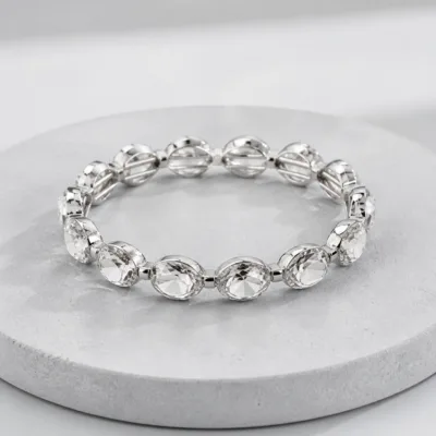 Pulseira transparente com pedras ovais de vidro facetado