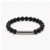 Pulseira de pedra natural preta mate com barra prateada