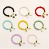 Pulseiras de contas com flor dourada em oito cores sortidas
