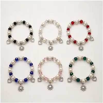 Seis modelos de pulseira de pérolas e cristais com sol prateado