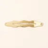 Gancho de cabelo ondulado dourado de 5 cm