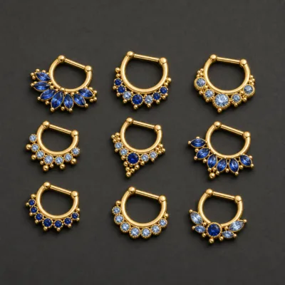 Piercing de septo dourados com zircónias azuis