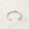 Piercing de septo em prata 925 com aro liso e bola