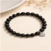 Pulseira de ónix preto com coração prateado
