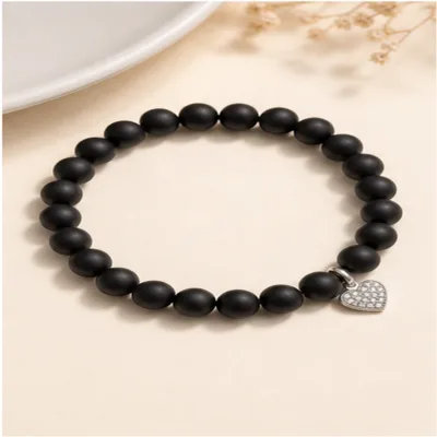 Pulseira de ónix preto com coração prateado