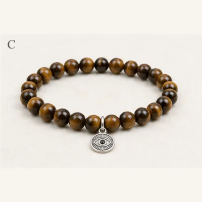 Pulseira de olho-de-tigre com olho turco prateado