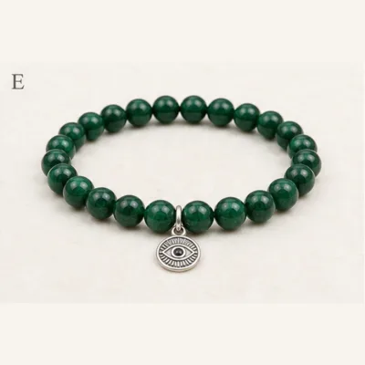 Pulseira verde esmeralda com olho turco prateado