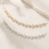 Acessório de cabelo para noiva com flores de zircónia em dourado e prateado