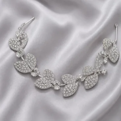 Acessório prateado de cabelo para noiva com folhas e zircónias