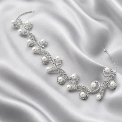 Acessório prateado de cabelo para noiva com pérolas e zircónias