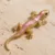 A — Dourado e rosa