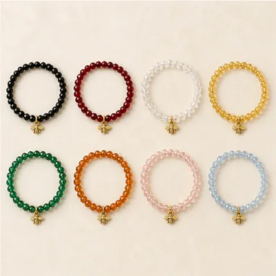 Oito cores da pulseira de cristal com abelha dourada