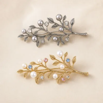 Alfinetes ramo com pérolas e cristais em prateado e dourado