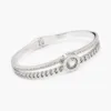 Bracelete prateado com corrente e cristal redondo central