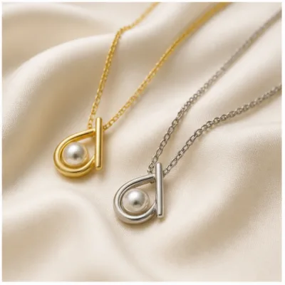 Pearl loop necklaces on cream fabric 84402-01