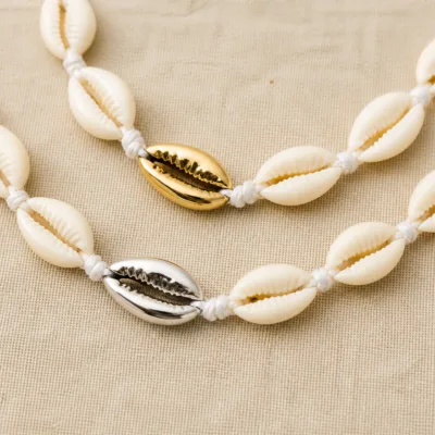 Gold and silver central cowrie shell accent detail 84470-01