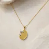Colar Dourado com Medalha e Cristais, 84801-01