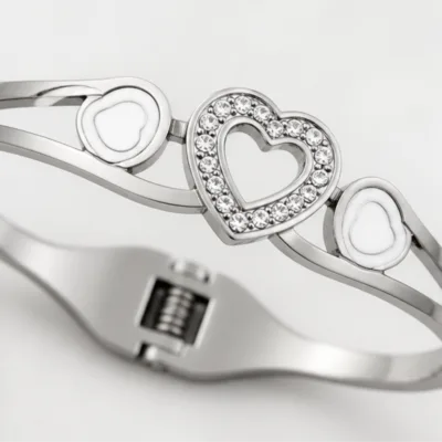 Close view of three heart motifs and hinge on bangle 84812