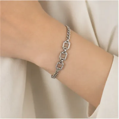 Silver-tone square-link bracelet 84843-01 worn on the wrist