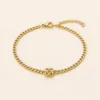 Pulseira de Corrente Dourada com Nó Central — Dourado