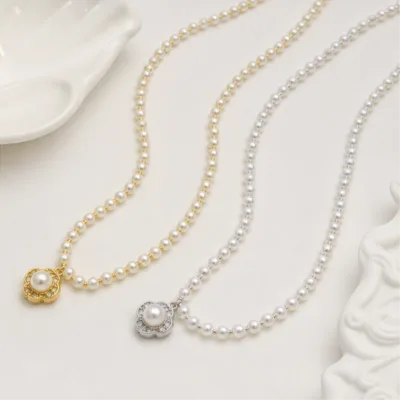 Pearl necklaces with halo pendants 84988-01