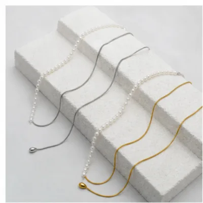 Silver and gold pearl snake-chain necklaces 84989-05