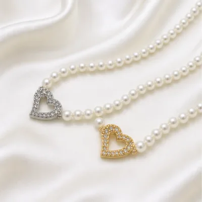 Silver and gold heart pearl necklaces 84990-01